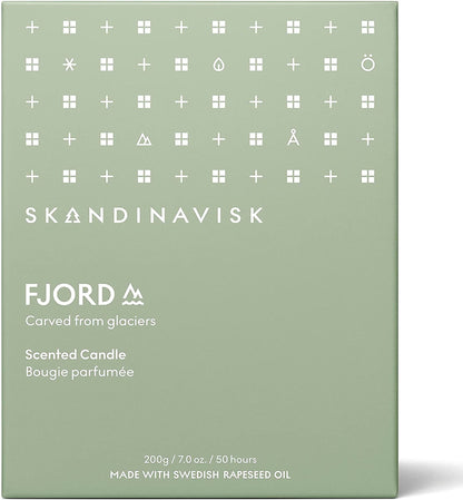 Skandinavisk Fjord Scented Candle. Fragrance Notes: Apple and Pear Blossom, Orchard Fruits and Redcurrants. 7.0 oz.